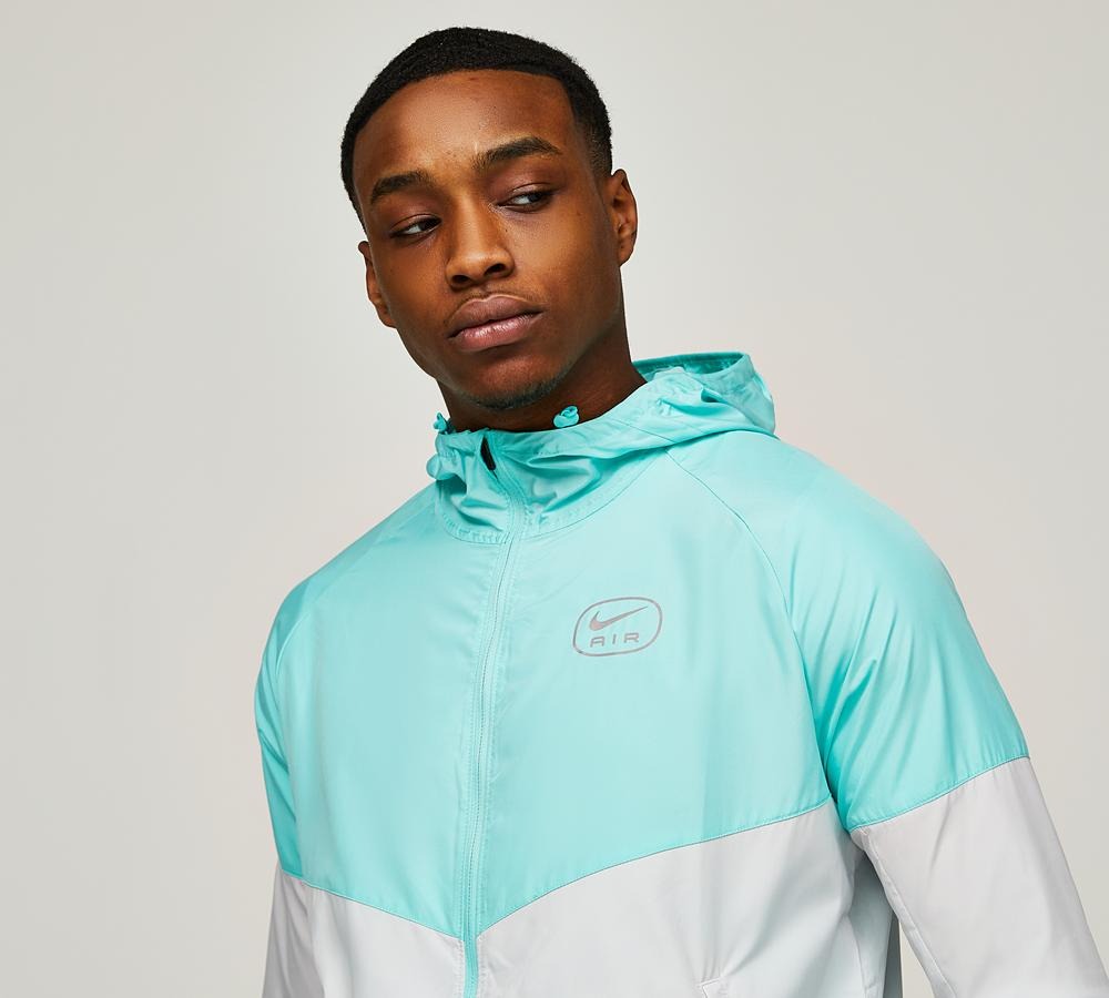 nike swoosh woven jacket teal